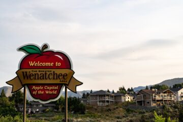The Wenatchee Washington apple sign on a cloudy day.